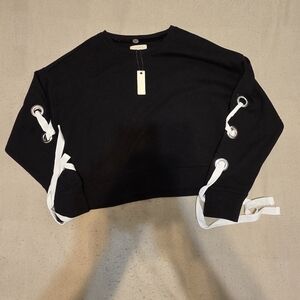 Brand new with tag, Black cropped Cupio sweatshirt with white lace-up details